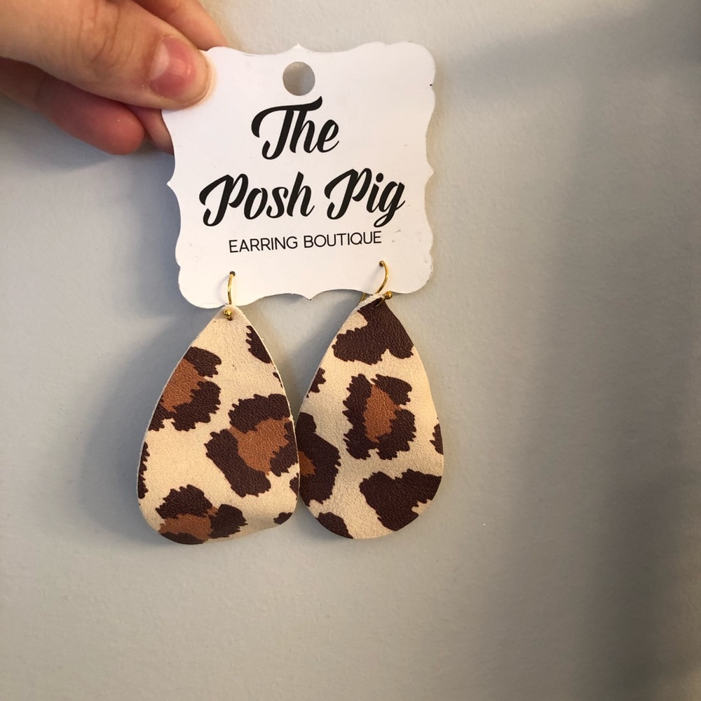 Never worn leopard earrings